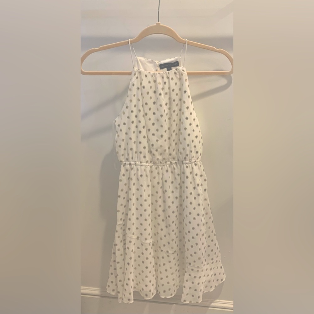 White dress with gold polka dots from Crystal Doll